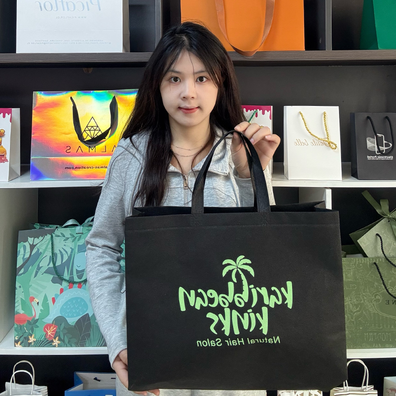 Black non-woven green printed tote bag
