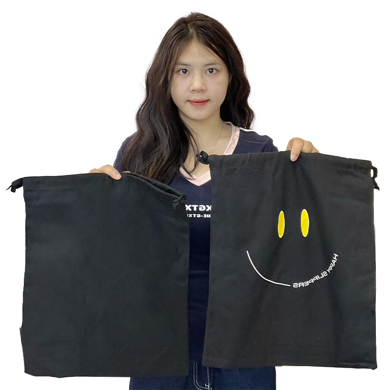 Black canvas drawstring bag