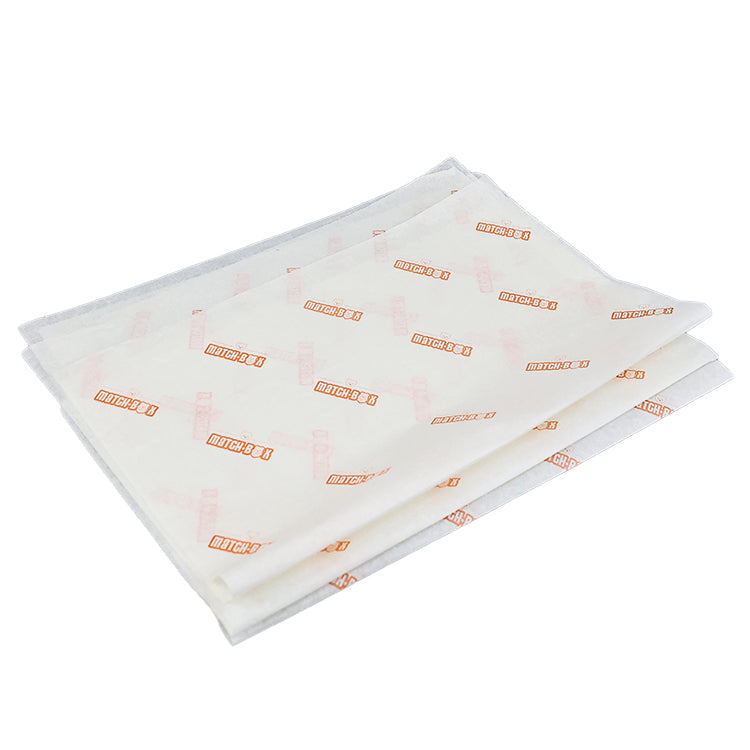Light yellow wrapping paper with orange pattern printing