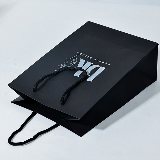 Black pattern printed white paper bag