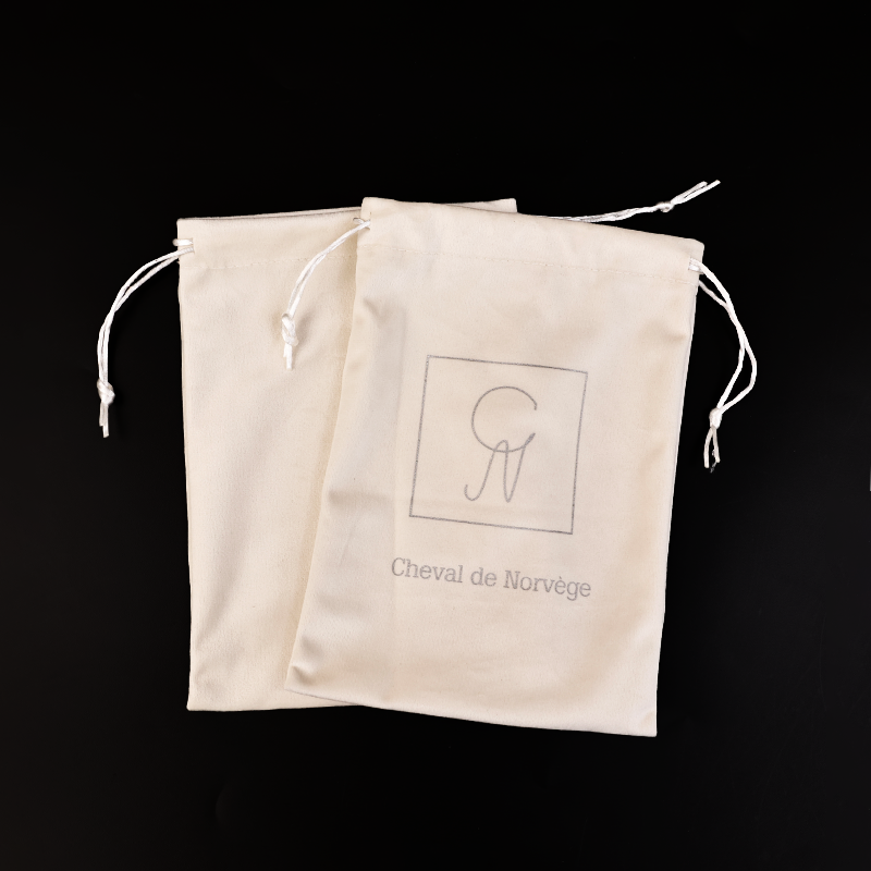 Light brown patterned silver flannel drawstring bag