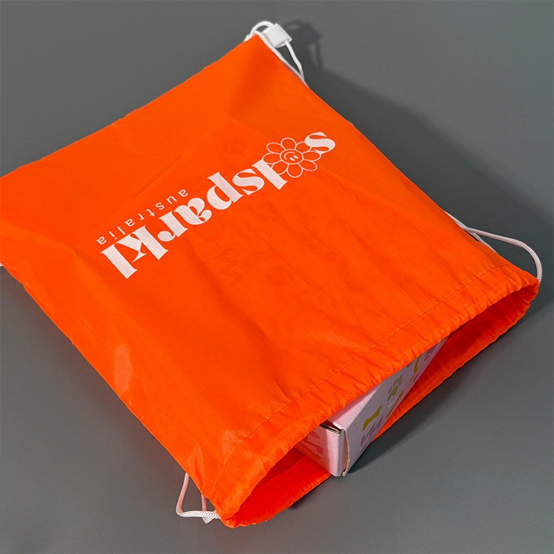 Orange drawstring backpack bag