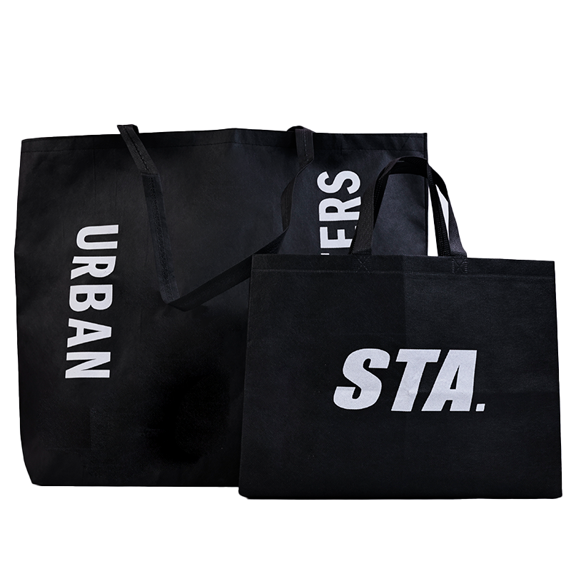 Various sizes of black non-woven bags