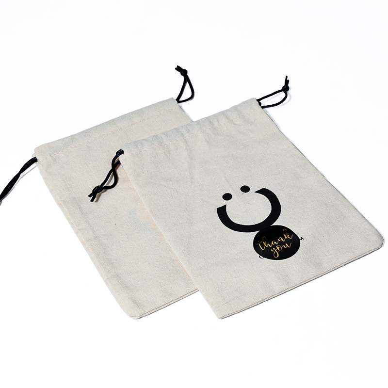 Off-white cotton drawstring bag