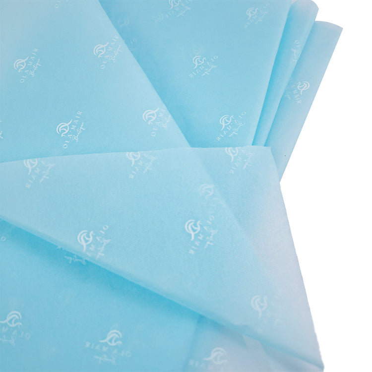 Blue wrapping paper pattern with white print