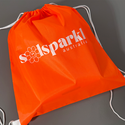 Orange drawstring backpack bag