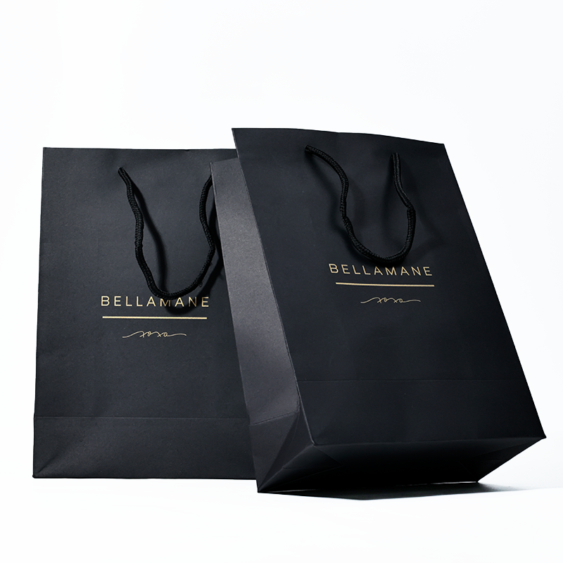 Black card tote bag with gold pattern