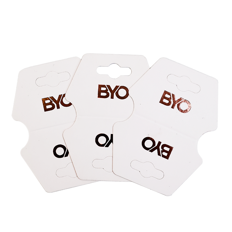 Various shapes of hot rose gold necklaces, earrings, clips and tags