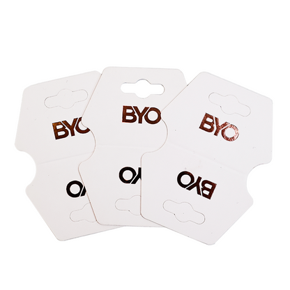 Various shapes of hot rose gold necklaces, earrings, clips and tags