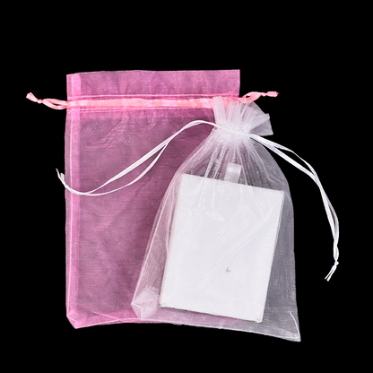 Pink and white organza drawstring bag