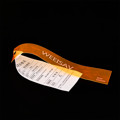 Multi-material combination tag