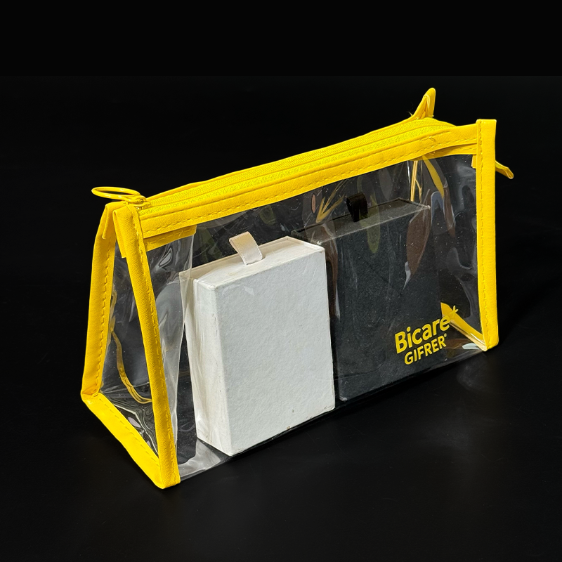 Transparent PVC yellow edging bottom zipper bag