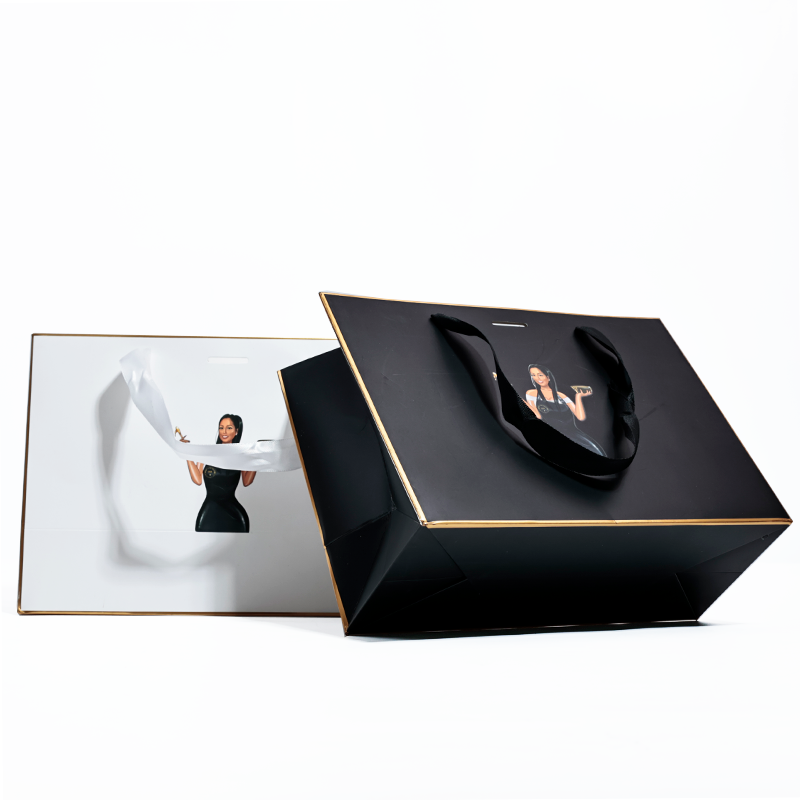 Black and white same style gold-painted paper bag