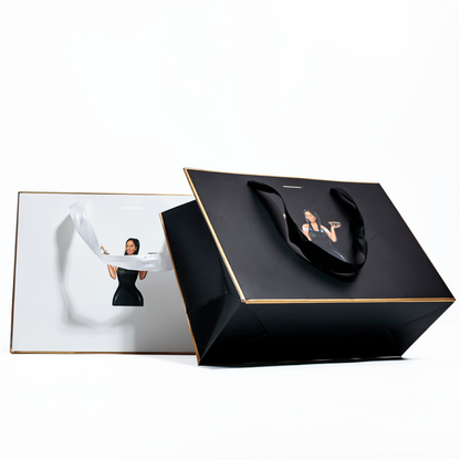 Black and white same style gold-painted paper bag