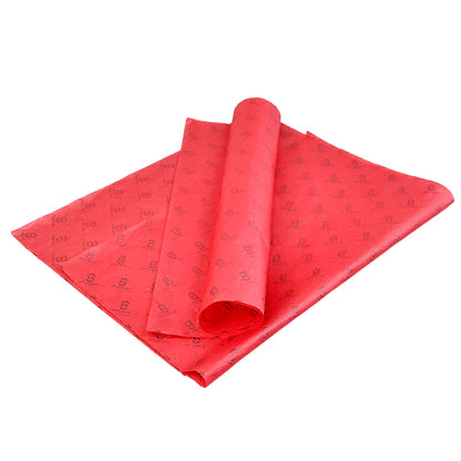 Red wrapping paper with black pattern printing