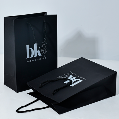 Black pattern printed white paper bag