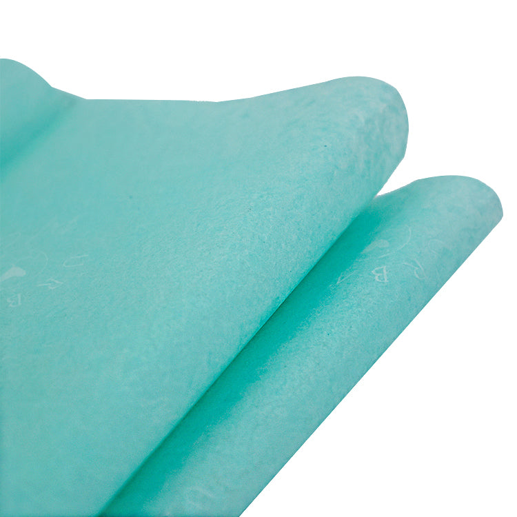 Turquoise wrapping paper pattern with white printing