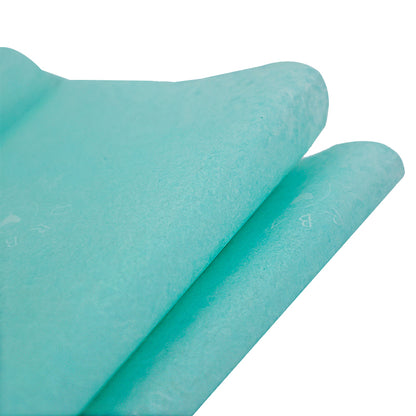 Turquoise wrapping paper pattern with white printing