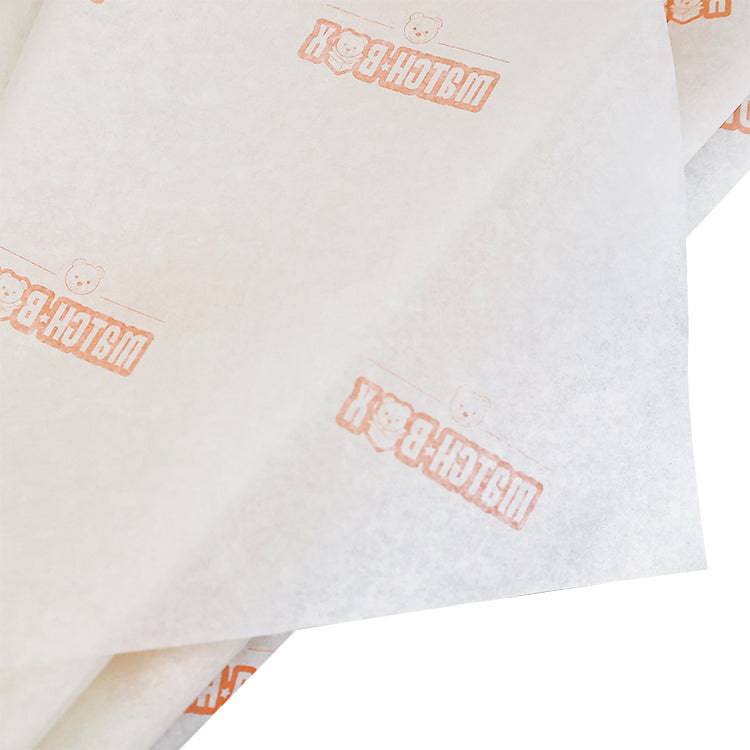 Light yellow wrapping paper with orange pattern printing