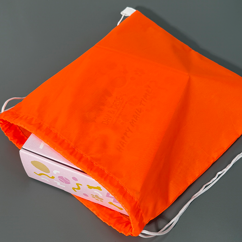 Orange drawstring backpack bag