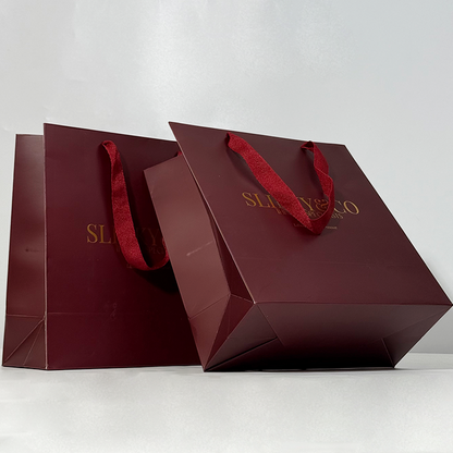 Red paper bag with gold stamping pattern