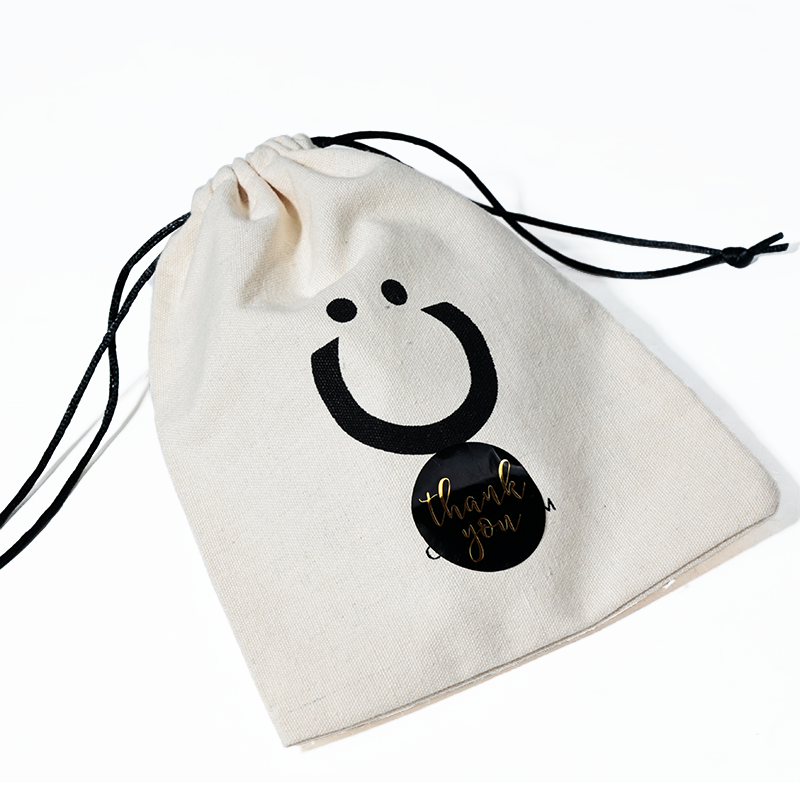 Off-white cotton drawstring bag