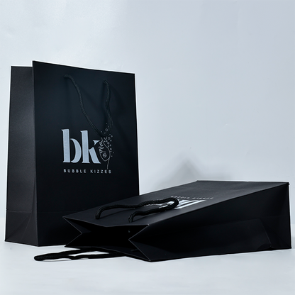 Black pattern printed white paper bag