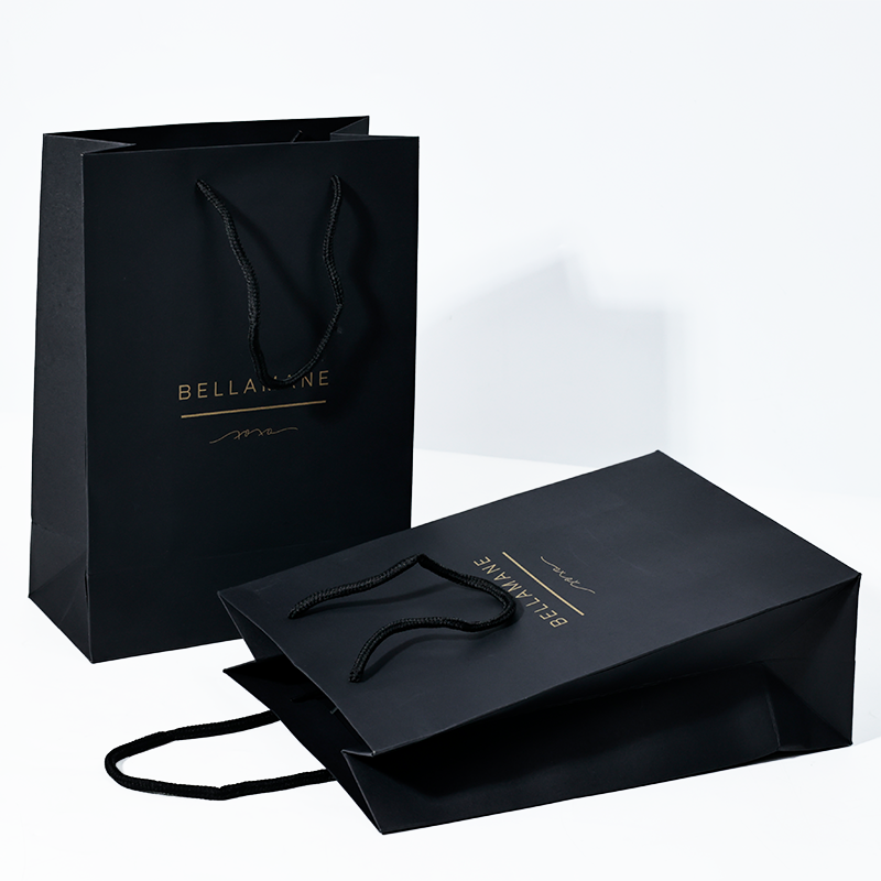 Black card tote bag with gold pattern