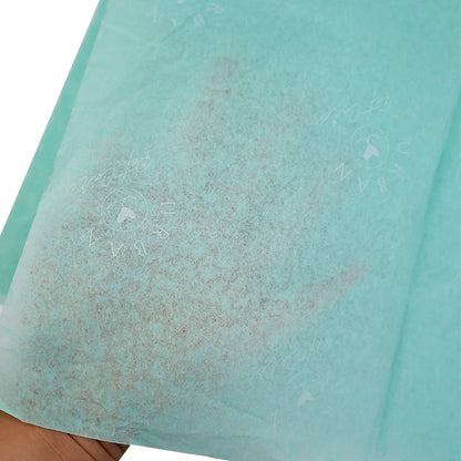 Turquoise wrapping paper pattern with white printing