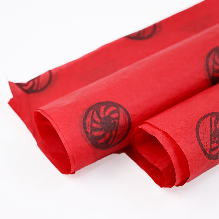 Red wrapping paper pattern with black printing