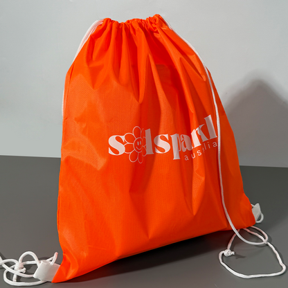 Orange drawstring backpack bag