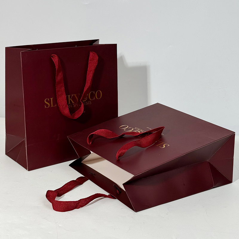 Red paper bag with gold stamping pattern