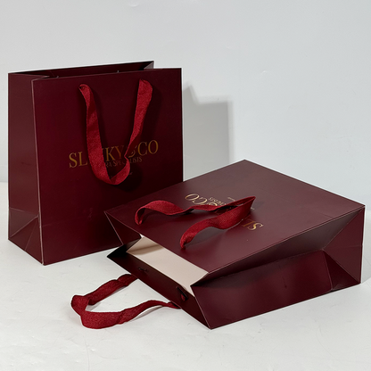 Red paper bag with gold stamping pattern