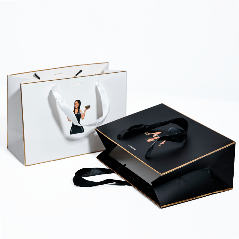 Black and white same style gold-painted paper bag