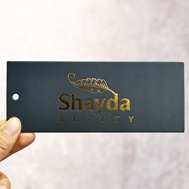 Dark green gold stamped long hangtag