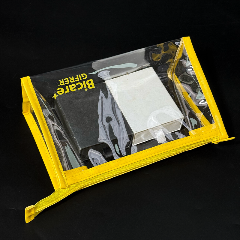 Transparent PVC yellow edging bottom zipper bag