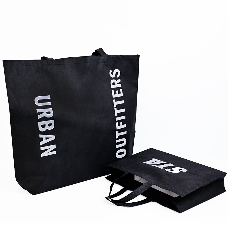 Various sizes of black non-woven bags