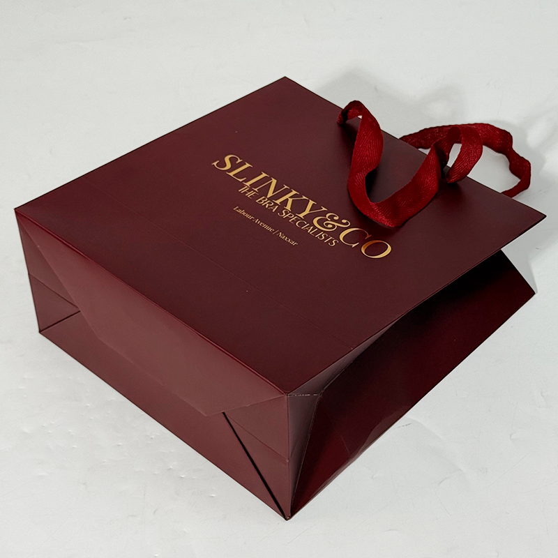 Red paper bag with gold stamping pattern