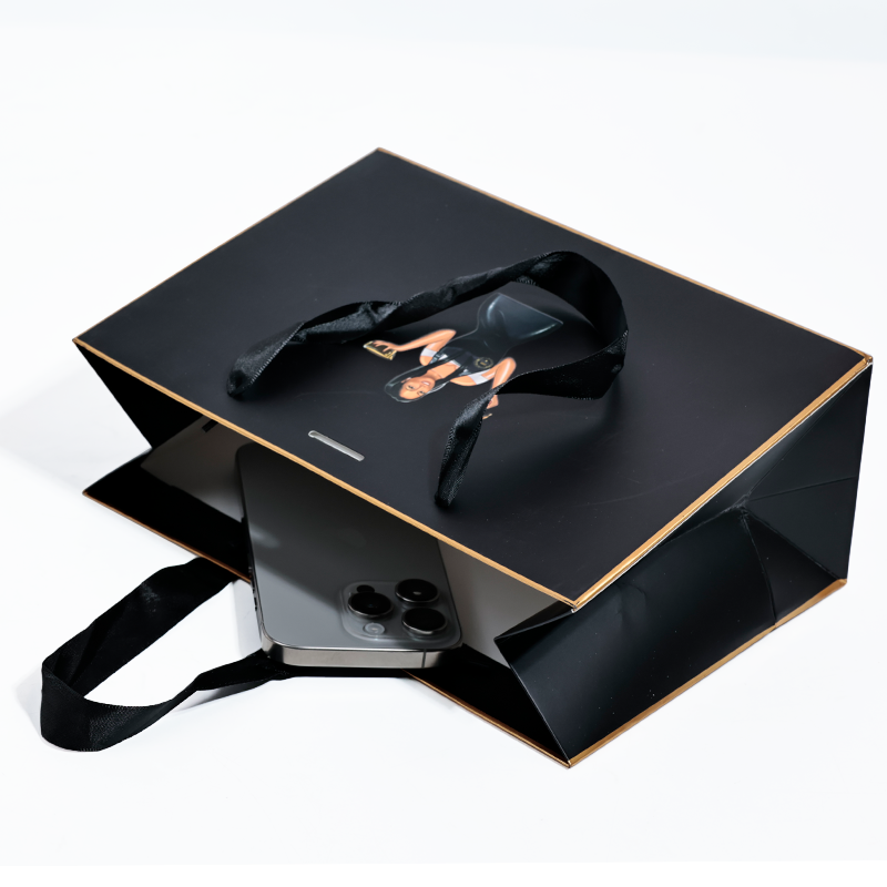 Black and white same style gold-painted paper bag