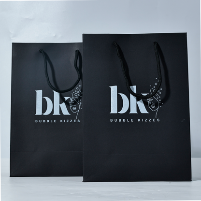 Black pattern printed white paper bag