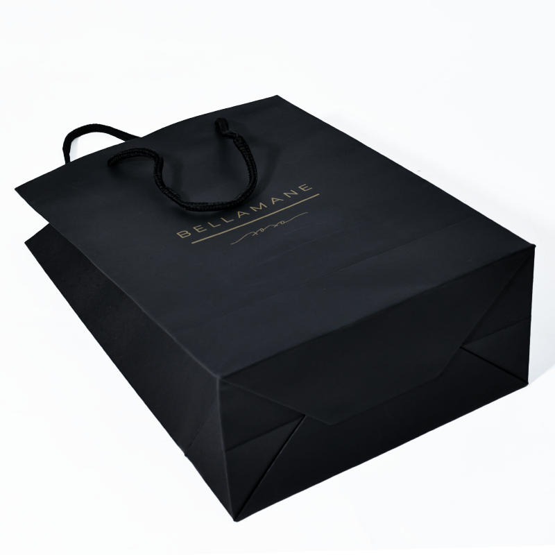 Black card tote bag with gold pattern