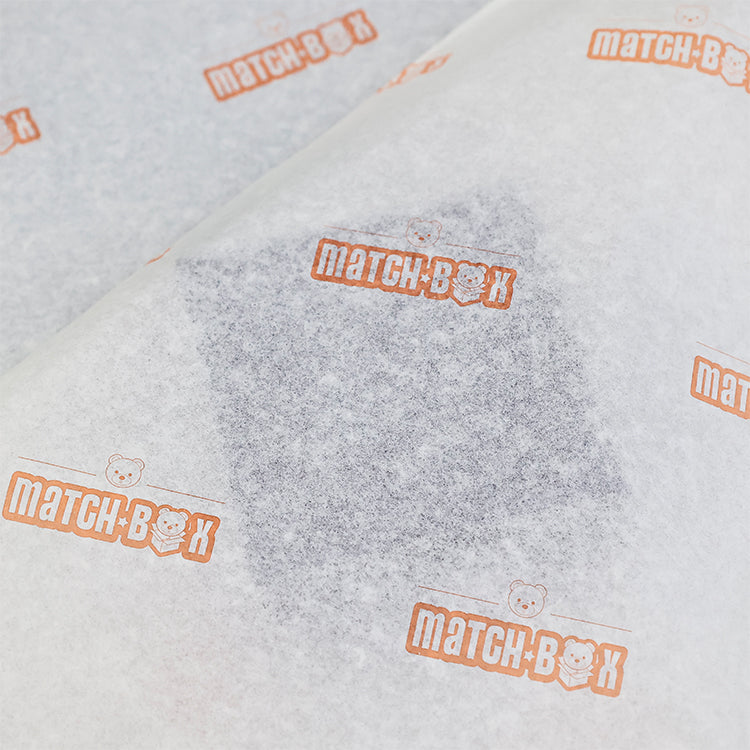 Light yellow wrapping paper with orange pattern printing