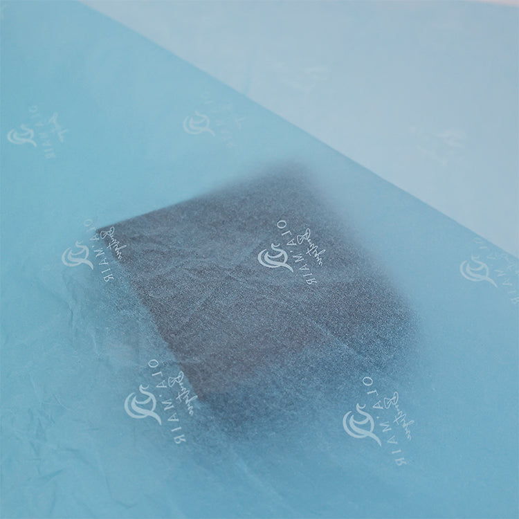Blue wrapping paper pattern with white print
