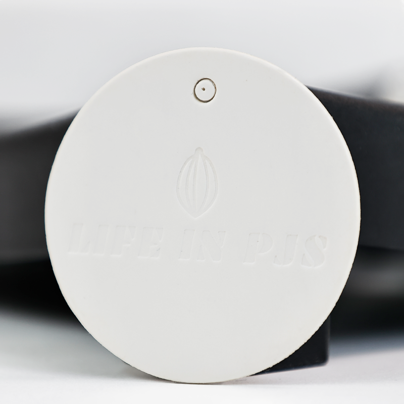 White round embossed hangtag