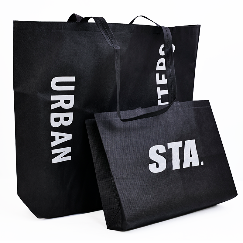 Various sizes of black non-woven bags