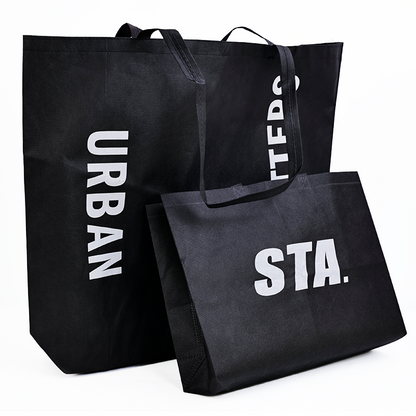 Various sizes of black non-woven bags