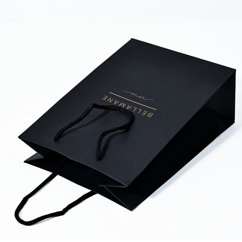 Black card tote bag with gold pattern