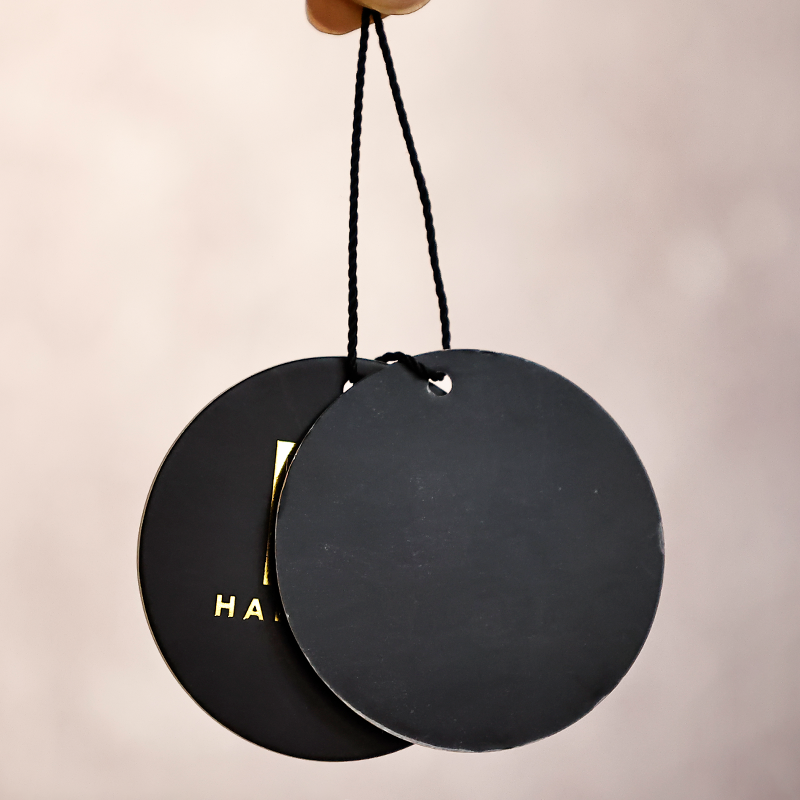 Black round pattern gold stamped hangtag