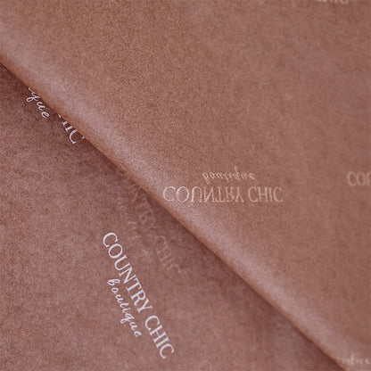 Chocolate wrapping paper with white pattern printing