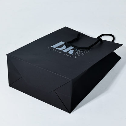 Black pattern printed white paper bag